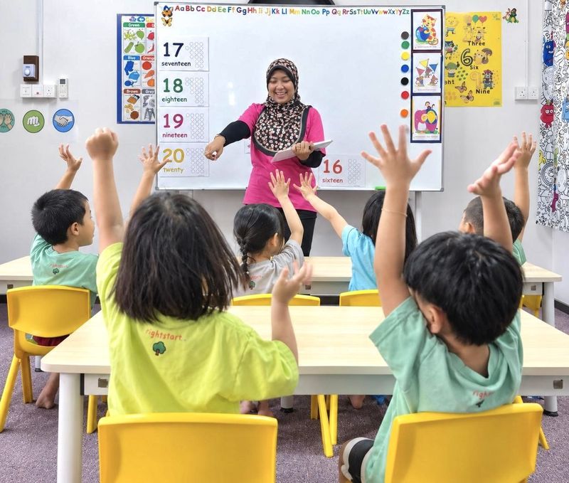 Nursery Bayan Lepas teacher with toddlers at RightStart
